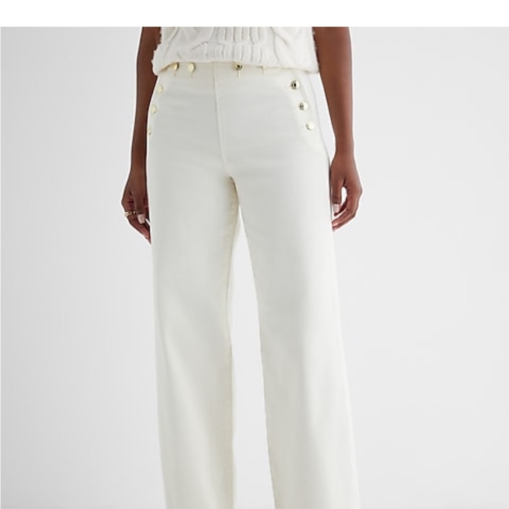 Express high waisted cream wide leg gold button jeans. Size 2R